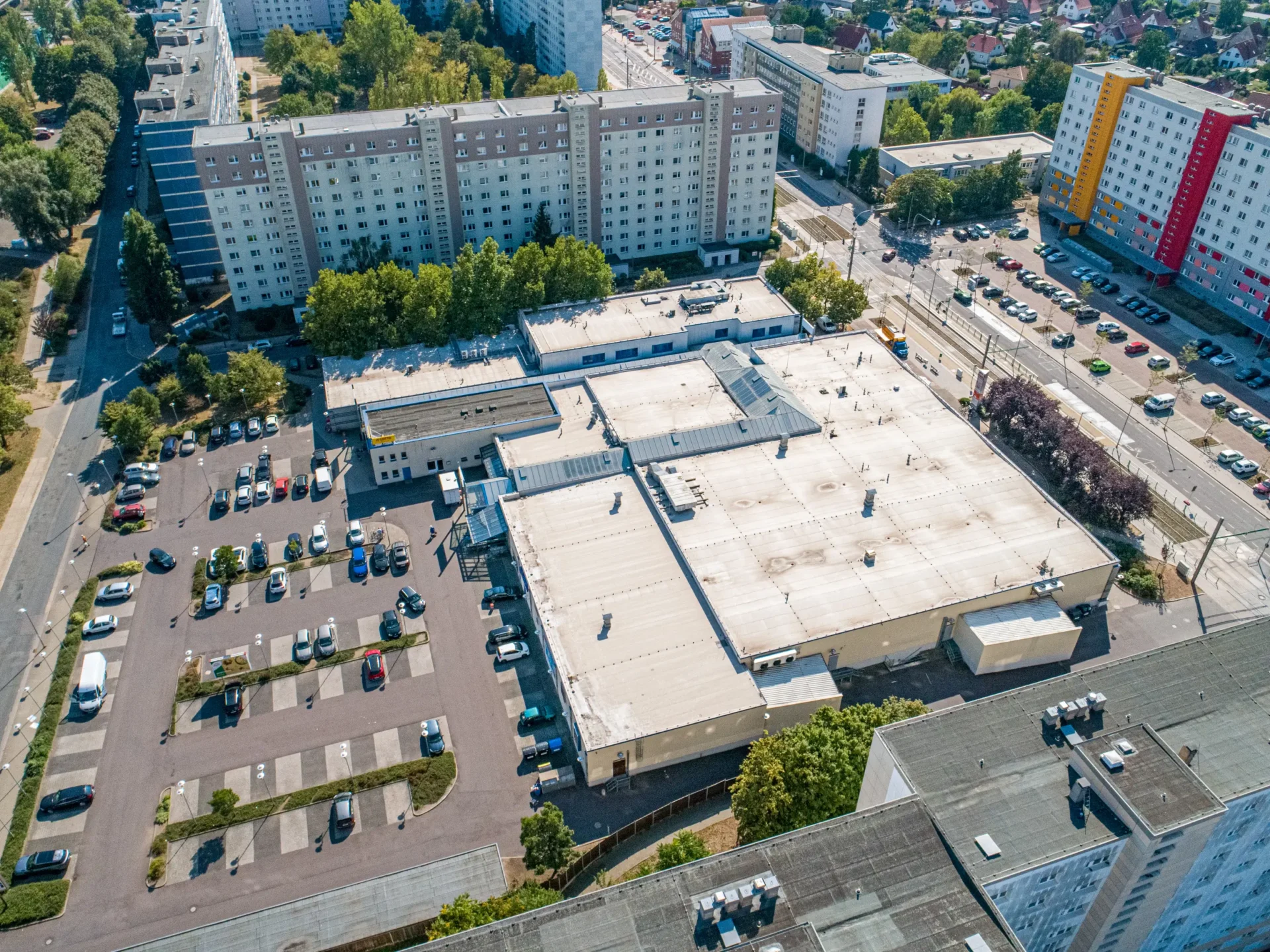 Aerial View Of A Parking Lot And Buildings
